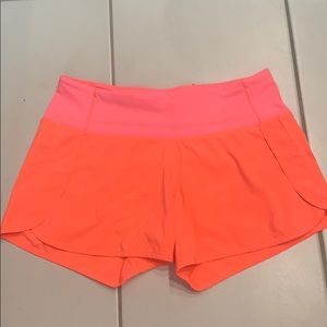 Bright orange speed up shorts